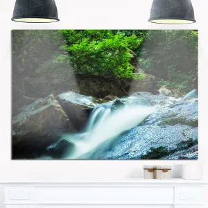 Designart Water Slide Over The Moss Landscape Metal Wall Art-20x12, 20x12