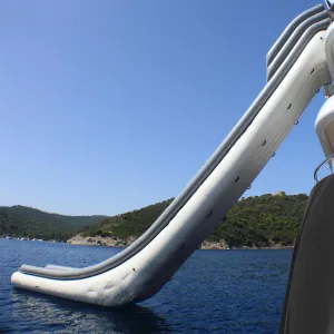 Outdoor Floating Inflatable Yacht Water Slide with Air Pump and Protective Net for Docks and Piers